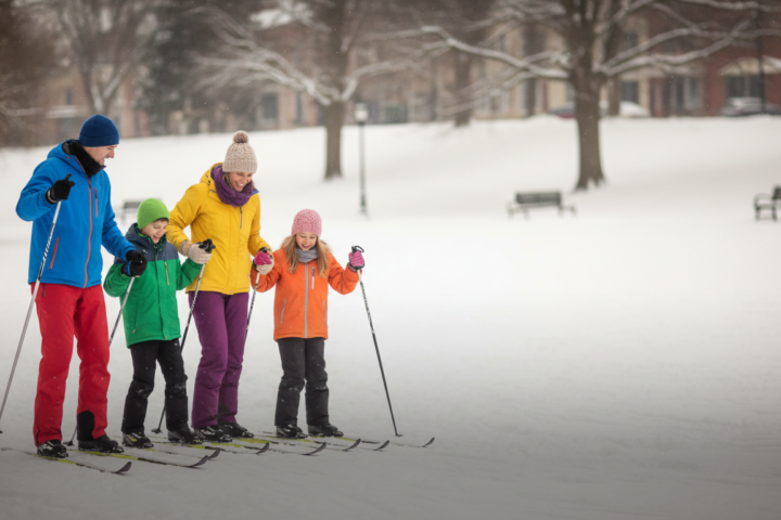 AI generated image of a family enjoying Nordic skiing in a local park