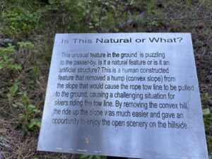 Trail sign about the former ski hill on Martin Ranch.