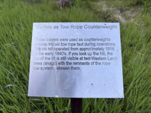 Trail sign about the former ski hill on Martin Ranch.